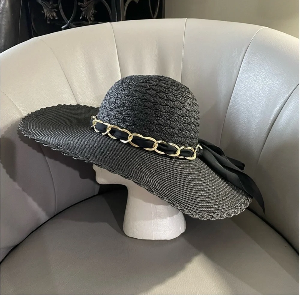 Marcus Adler New York black floppy hat with gold chain and sheer scarf accent